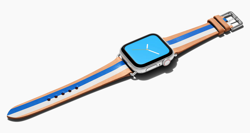 Strap for the Apple Watch handmade of natural vegetable tanned leather with two hand-painted stripes in bright blue and white in women's length which measures: 105mm and 65mm. Hardware offered in gold, black, or silver in the small and large size. Price $400 plus shipping. Please reach out with any questions. 