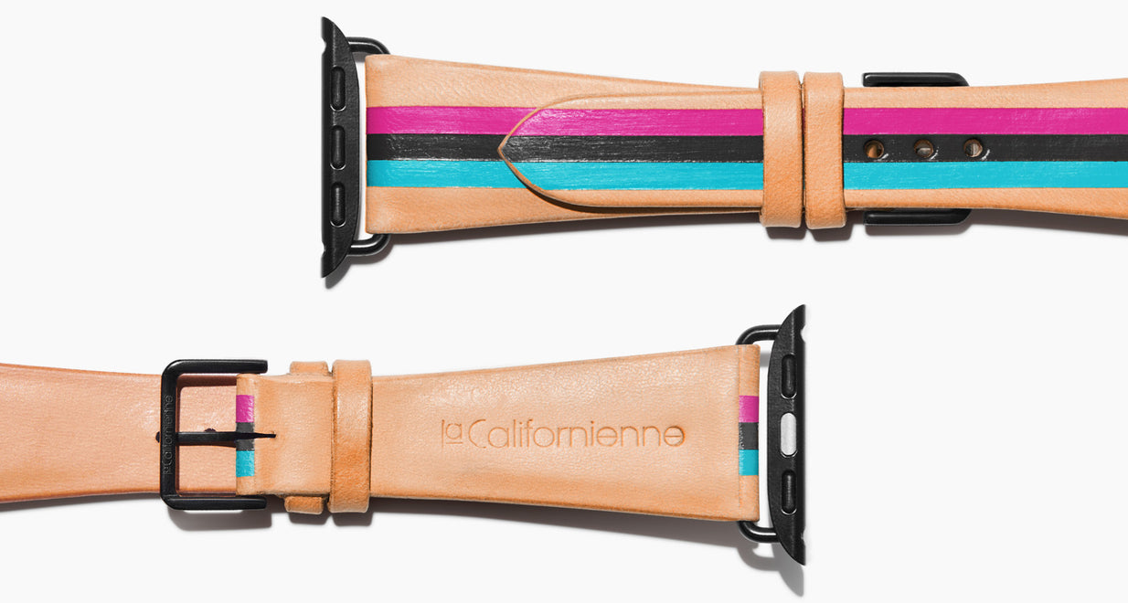 Strap for the Apple Watch handmade of natural vegetable tanned leather with three hand-painted stripes in magenta, black, aqua in women's length which measures: 105mm and 65mm. Hardware offered in gold, black, or silver in the small and large size. Price $400 plus shipping. Please reach out with any questions. 