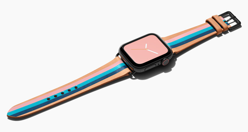Strap for the Apple Watch handmade of natural vegetable tanned leather with three hand-painted stripes in petal pink, aqua, and navy in women's length which measures: 105mm and 65mm. Hardware offered in gold, black, or silver in the small and large size. Price $400 plus shipping. Please reach out with any questions. 