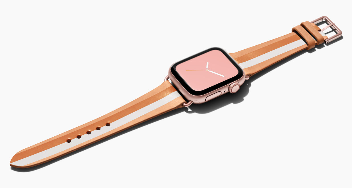 Strap for the Apple Watch handmade of natural vegetable tanned leather with a hand-painted Rose Gold metallic and whitE stripes in women's length which measure: 105mm and 65mm. Hardware offered in gold, black, or silver in the small and large size. Price $400 plus shipping. Please reach out with any questions. 