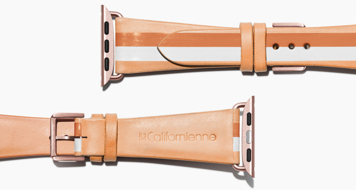 Strap for the Apple Watch handmade of natural vegetable tanned leather with a hand-painted Rose Gold metallic and whitE stripes in women's length which measure: 105mm and 65mm. Hardware offered in gold, black, or silver in the small and large size. Price $400 plus shipping. Please reach out with any questions. 