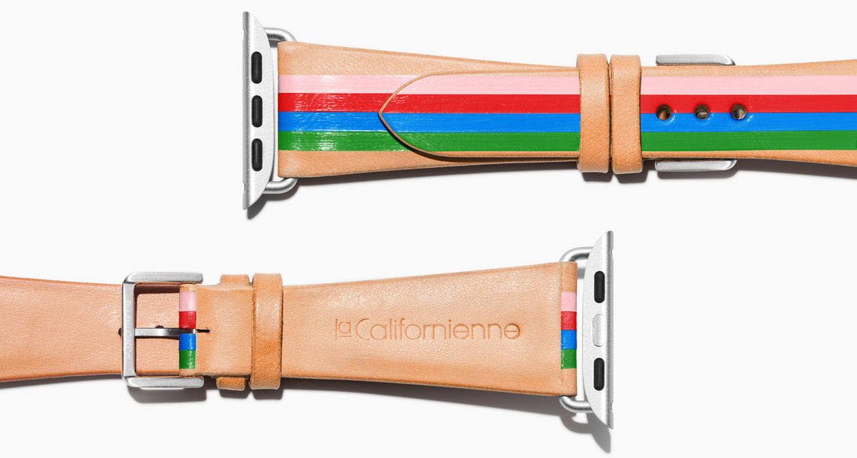 Strap for the Apple Watch handmade of natural vegetable tanned leather with four hand-painted stripes in pink, red, blue, kelly green in women's length which measures: 105mm and 65mm. Hardware offered in gold, black, or silver in the small and large size. Price $400 plus shipping. Please reach out with any questions. 