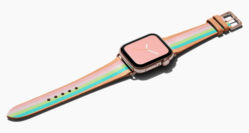 Strap for the Apple Watch handmade of natural vegetable tanned leather with four hand-painted stripes in petal pink, shell pink, light lime green, aqua in women's length which measures: 105mm and 65mm. Hardware offered in gold, black, or silver in the small and large size. Price $400 plus shipping. Please reach out with any questions. 