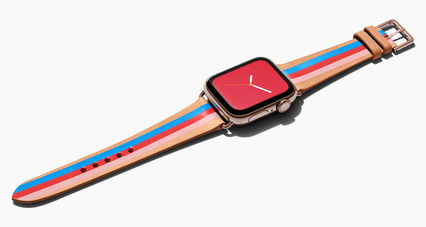 Strap for the Apple Watch handmade of natural vegetable tanned leather with three hand-painted stripes in bright blue, red, and petal pink in women's length which measures: 105mm and 65mm. Hardware offered in gold, black, or silver in the small and large size. Price $400 plus shipping. Please reach out with any questions. 