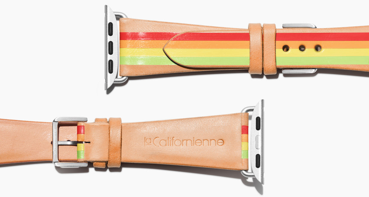 Strap for the Apple Watch handmade of natural vegetable tanned leather with four hand-painted stripes in red, orange, yellow, light lime green in women's length which measures: 105mm and 65mm. Hardware offered in gold, black, or silver in the small and large size. Price $400 plus shipping. Please reach out with any questions. 