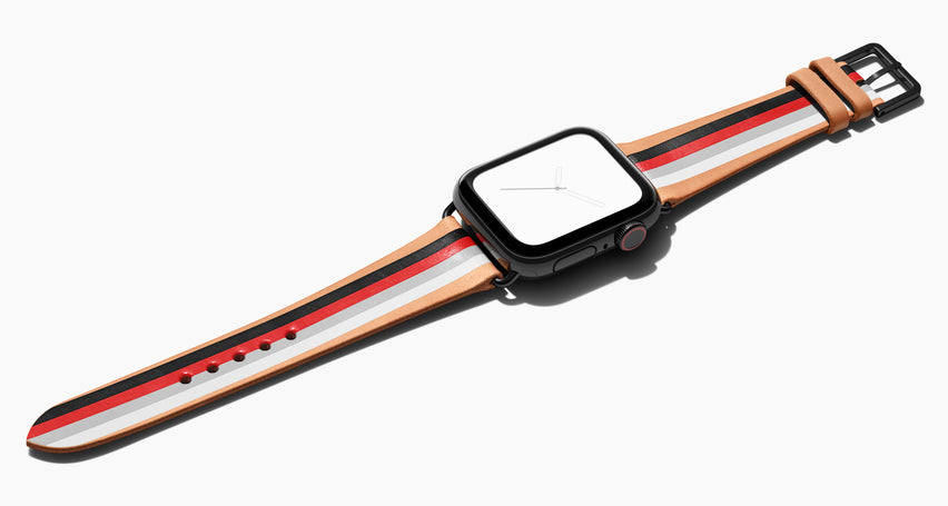 Strap for the Apple Watch handmade of natural vegetable tanned leather with four hand-painted stripes in black, red, grey, white in men's length which measures: 105mm and 75mm. Hardware offered in gold, black, or silver in the small and large size. Price $400 plus shipping. Please reach out with any questions. 