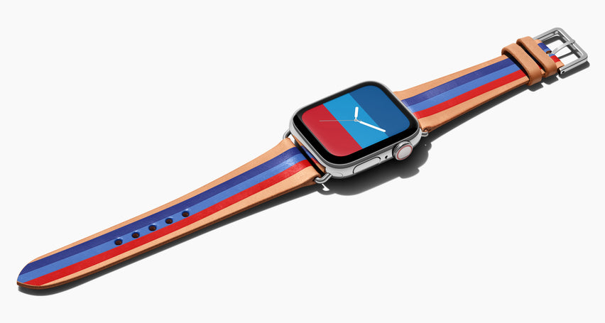 Strap for the Apple Watch handmade of natural vegetable tanned leather with three hand-painted stripes in navy, bright blue, red in men's length which measures: 105mm / 75mm. Hardware offered in gold, black, or silver in the small and large size. Price $400 plus shipping. Please reach out with any questions. 