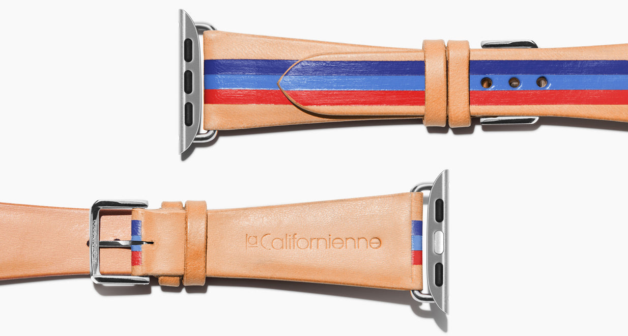 Strap for the Apple Watch handmade of natural vegetable tanned leather with three hand-painted stripes in navy, bright blue, red in men's length which measures: 105mm / 75mm. Hardware offered in gold, black, or silver in the small and large size. Price $400 plus shipping. Please reach out with any questions. 
